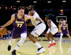 IM体育官网-魔术碾压太阳，东契奇刷新纪录的简单介绍